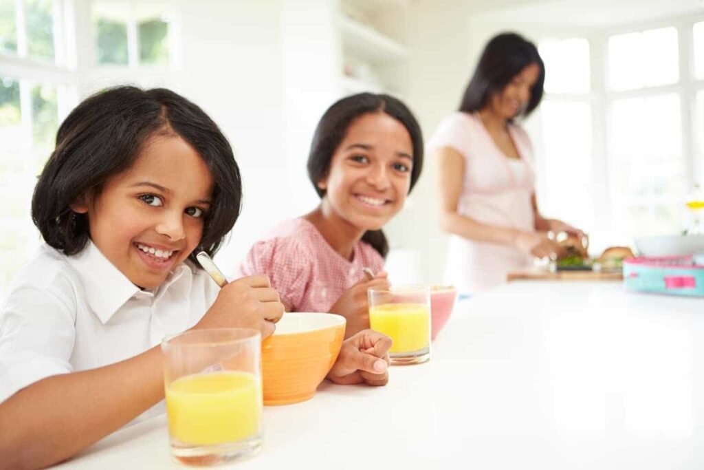 kid making breakfast