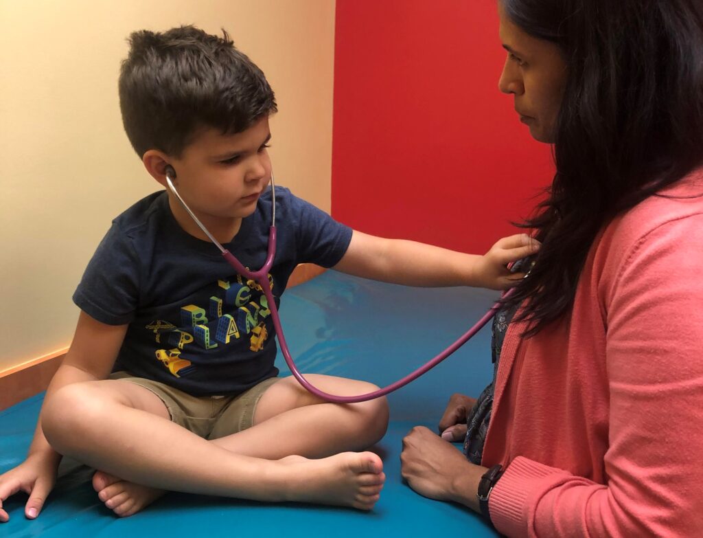 Dr. Dalvi with child